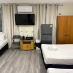 Family-Room with 1 Queen Bed and 3 Single Beds