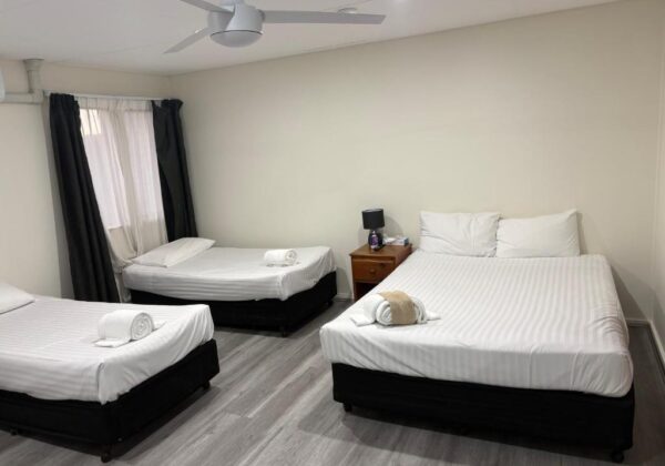 Family Room with 1 Queen Bed and 3 Single Beds